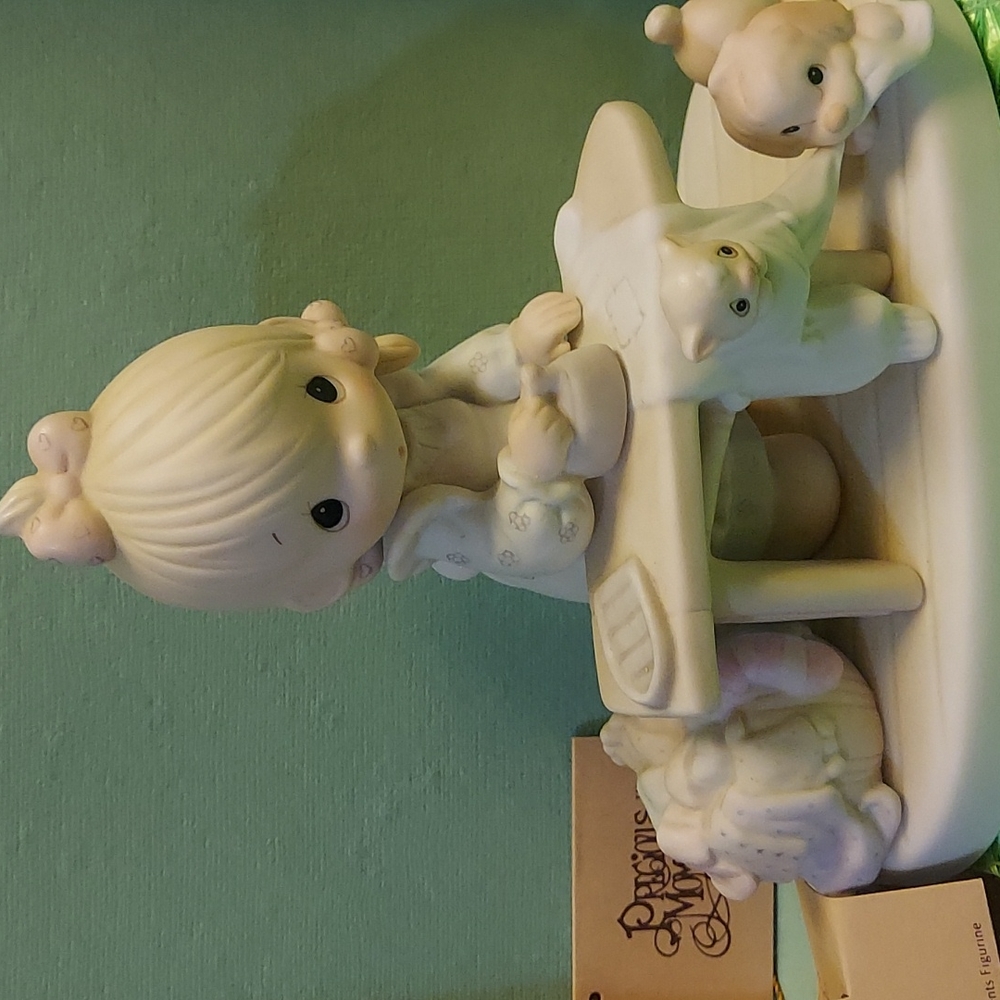 Precious Moments, Press on Fgurine